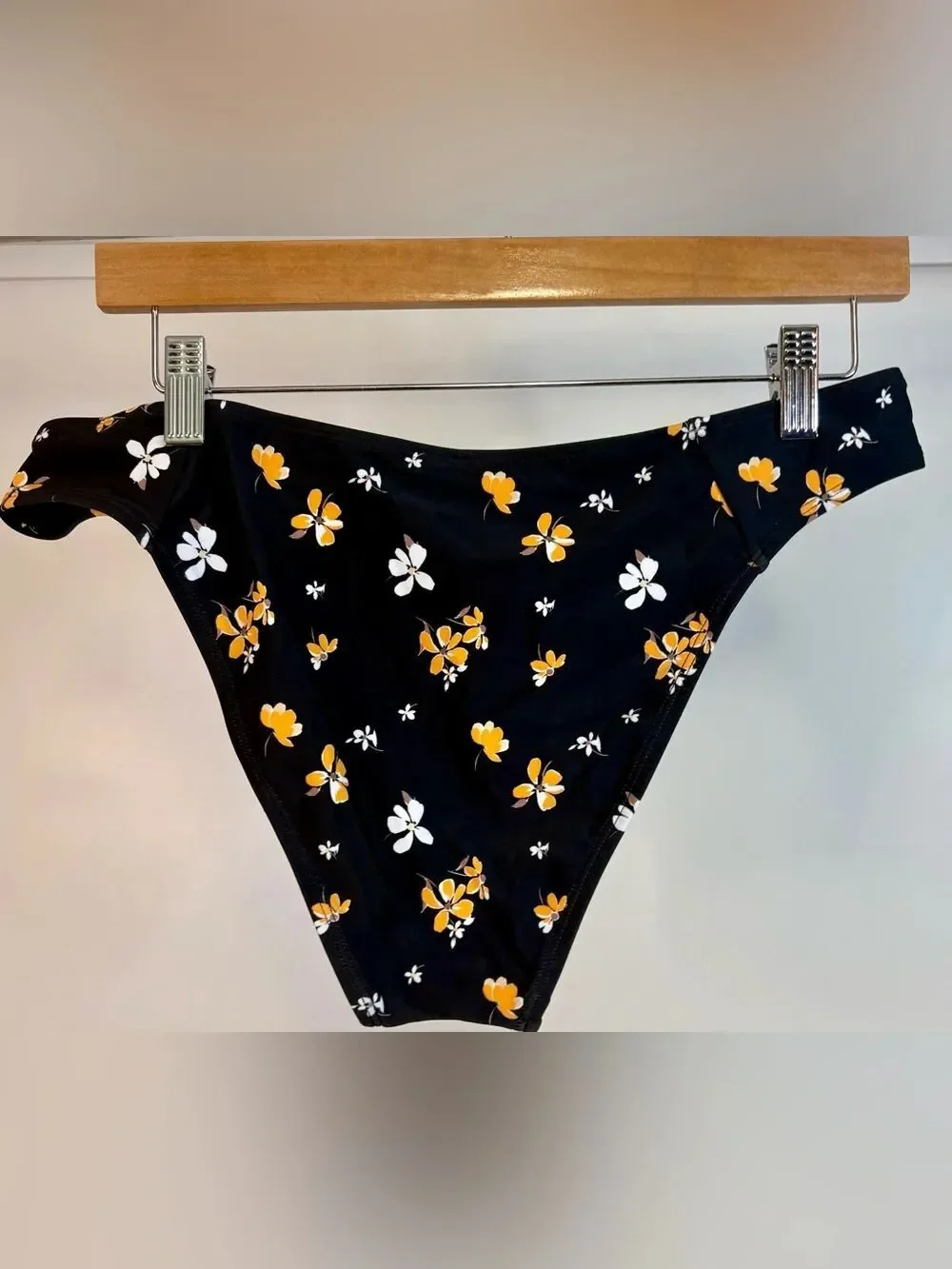NWT Cupshe black swimsuit with orange and yellow floral trim L